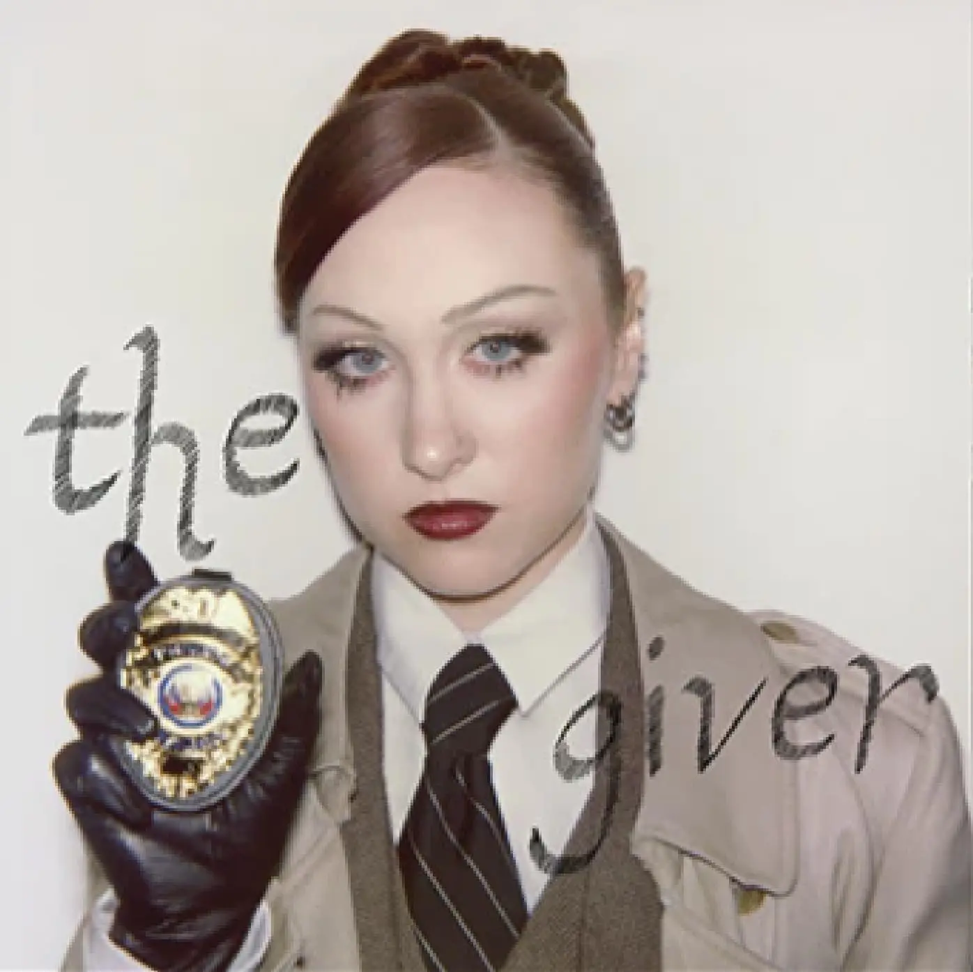 The Giver (7" 45 Rpm Silver Vinyl/The Private Investigator Edition)