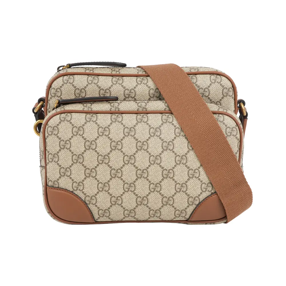 【GUCCI】GG Emblem 中款前口袋拉鍊斜背包(烏木/深棕色)/ 平行輸入